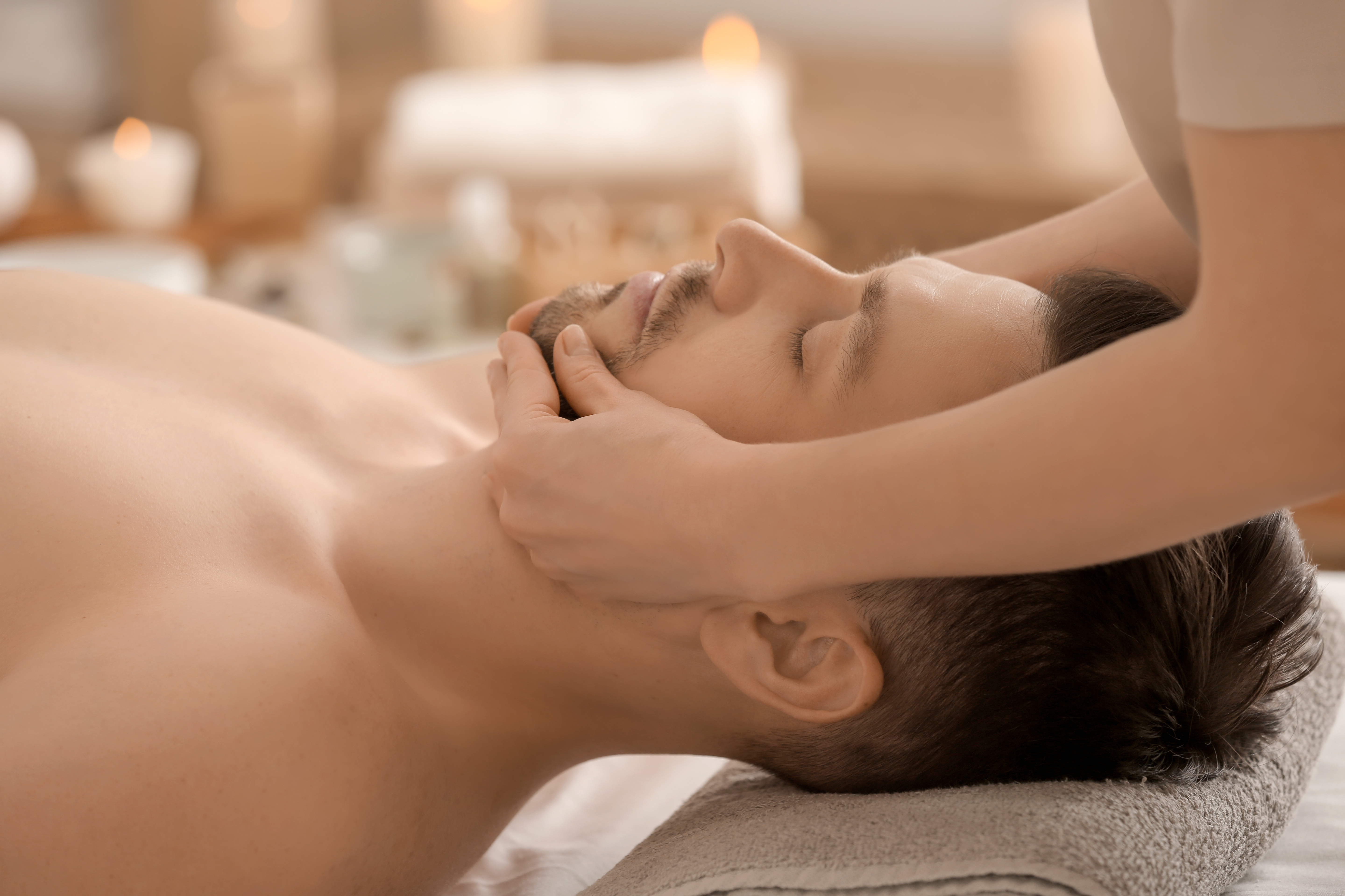 man having facial massage beautyandhairdressing