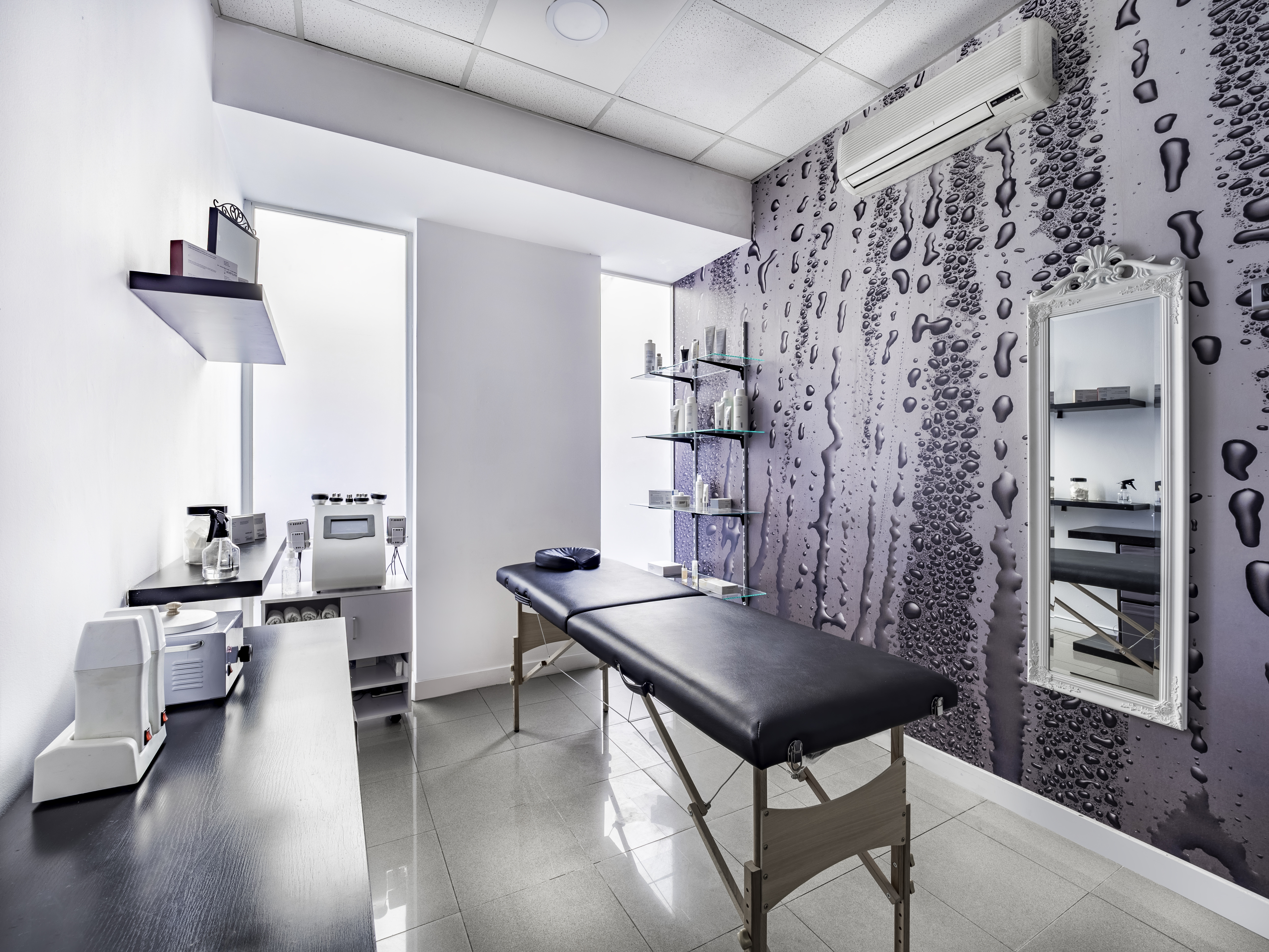 Grey themed beauty salon treatment room